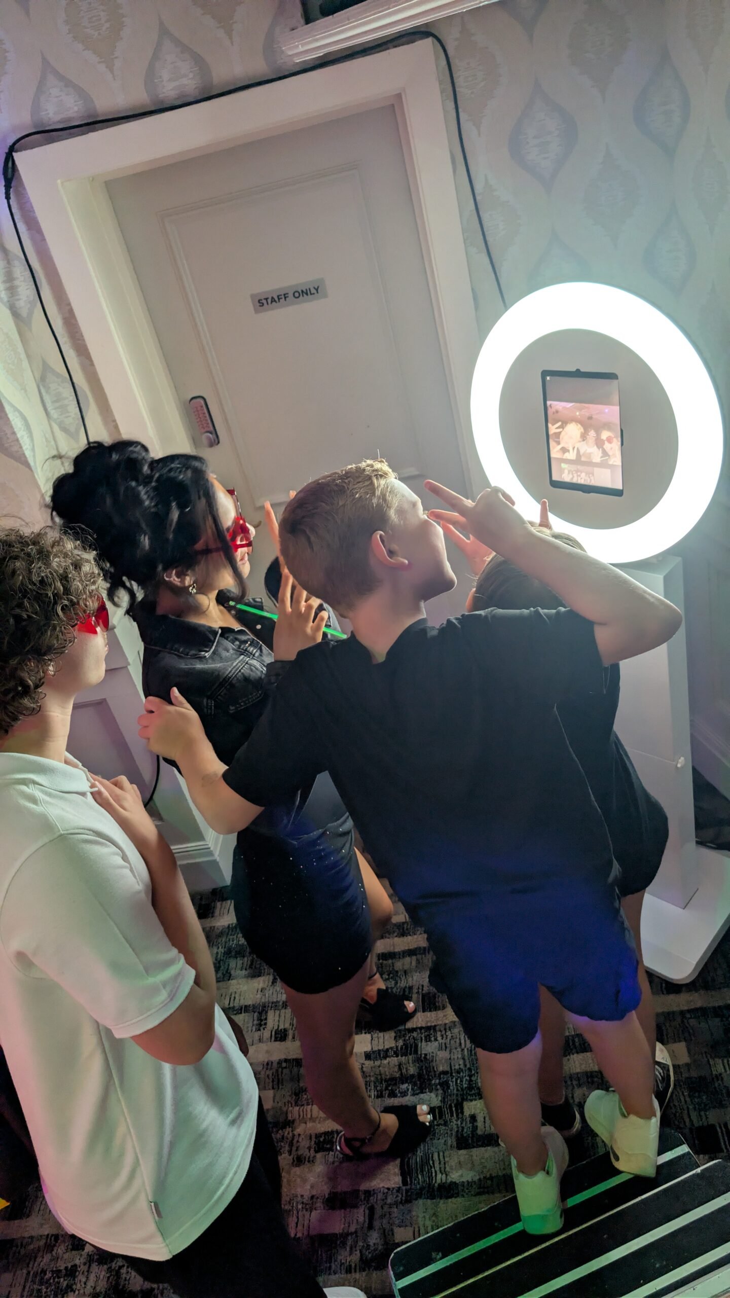 Guests using the Discobooth Events Selfie Pod at an event